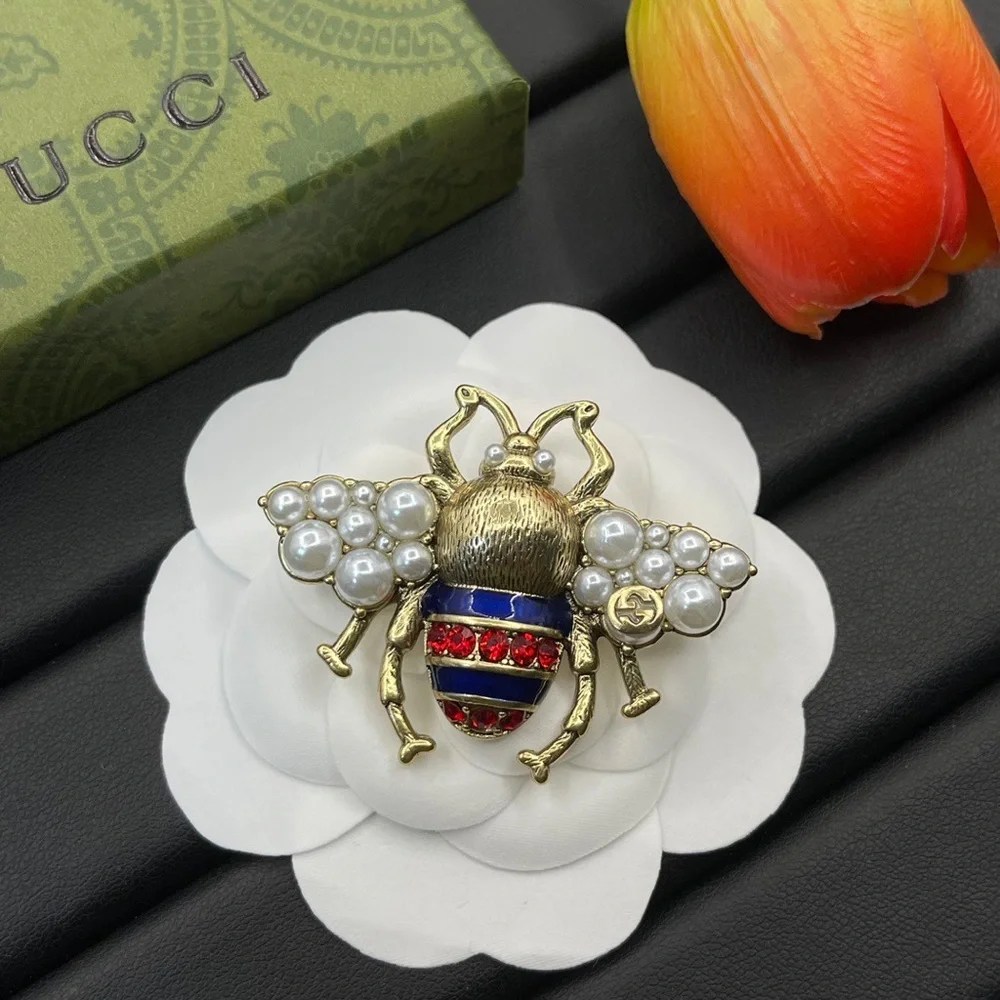 Gucci Gold-Tone Bee Brooch with Pearls and Red & Blue Enamel